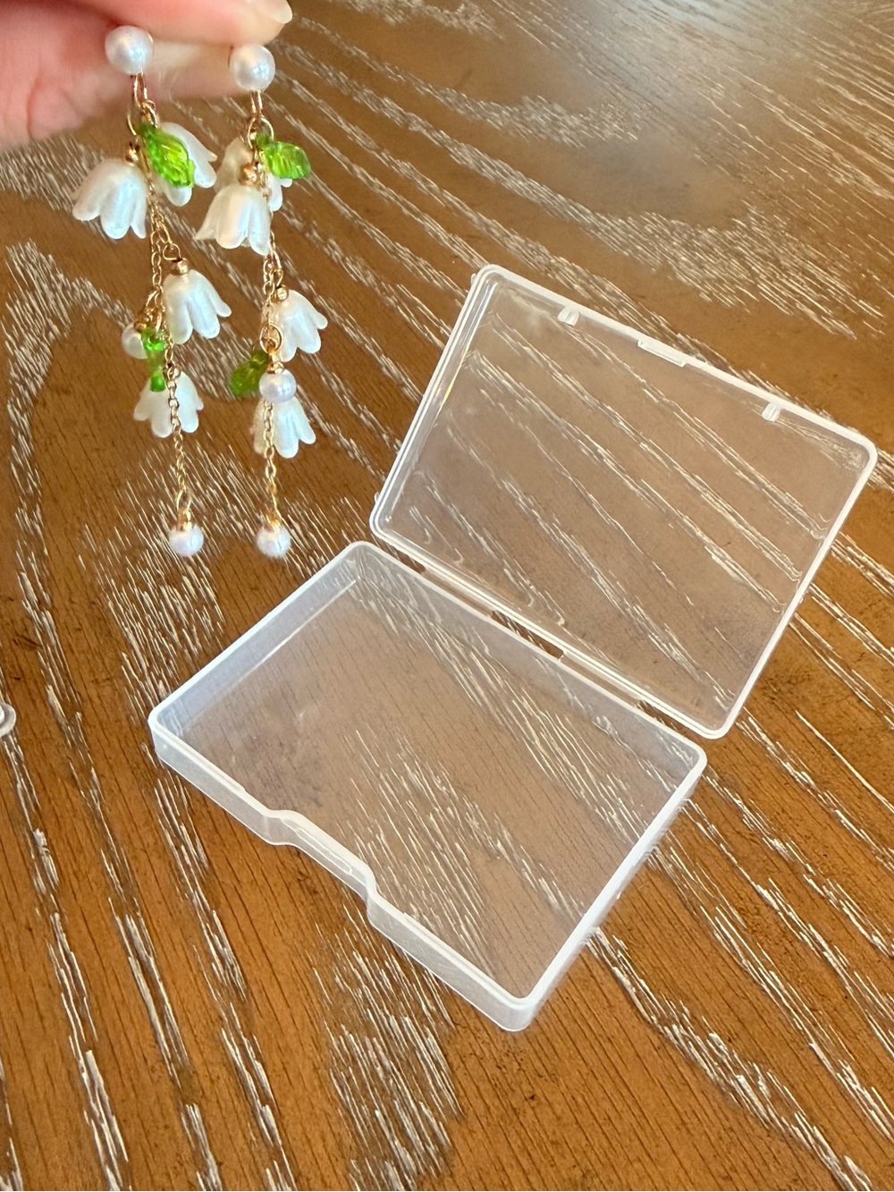 Delicate White Flower Dangle Earrings with Green Leaf Accents new in box